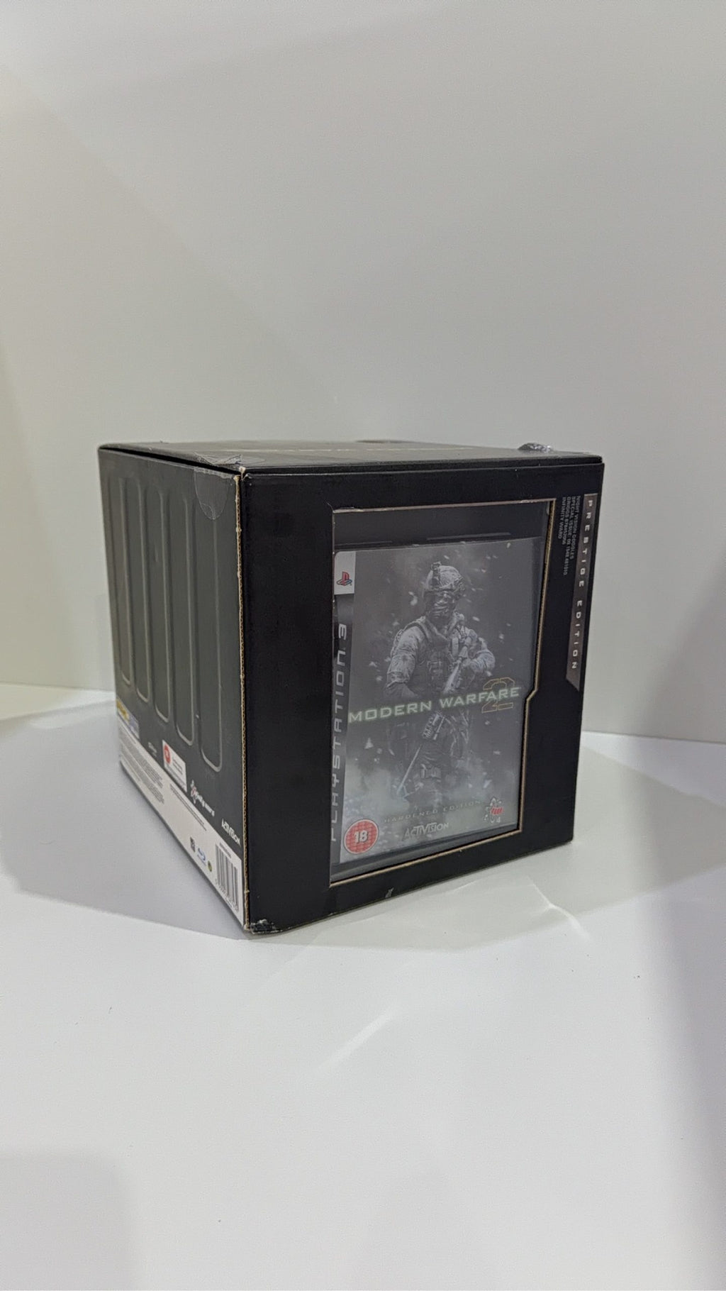Call of Duty Modern Warfare 2 Prestige Edition PS3 with Night Vision Goggles and display stand.