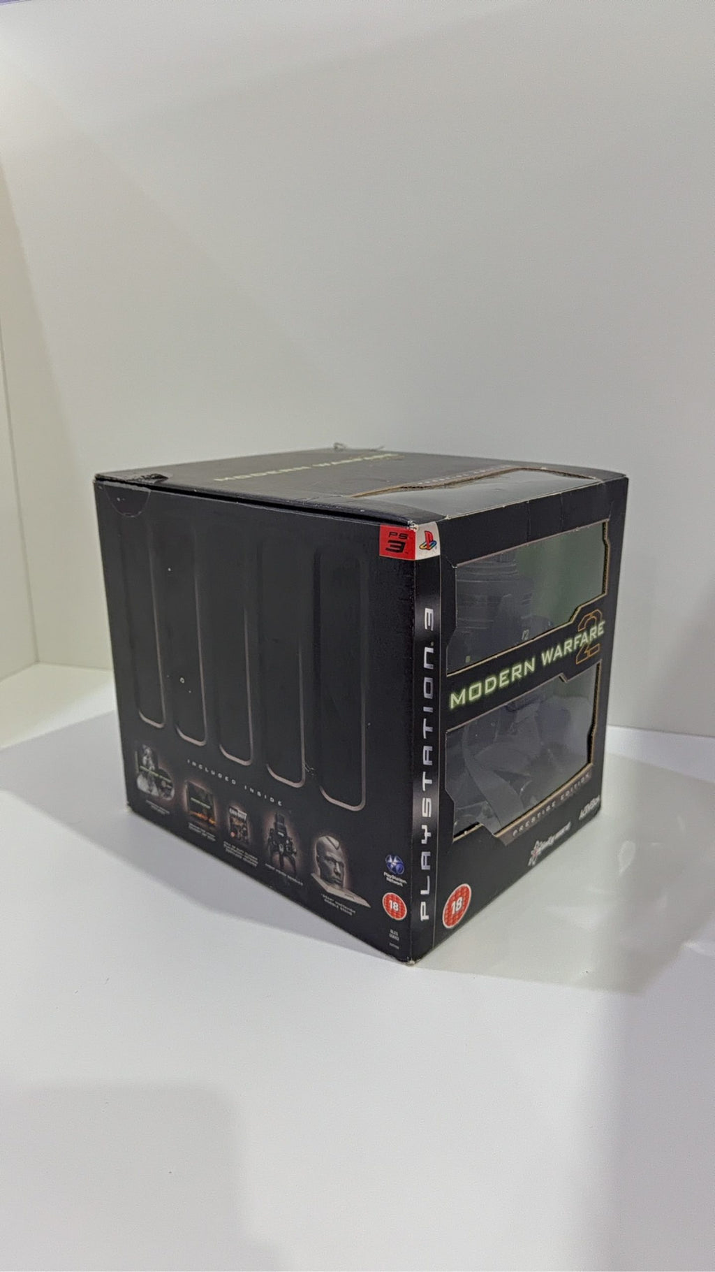 Call of Duty Modern Warfare 2 Prestige Edition PS3 with Night Vision Goggles and display stand.