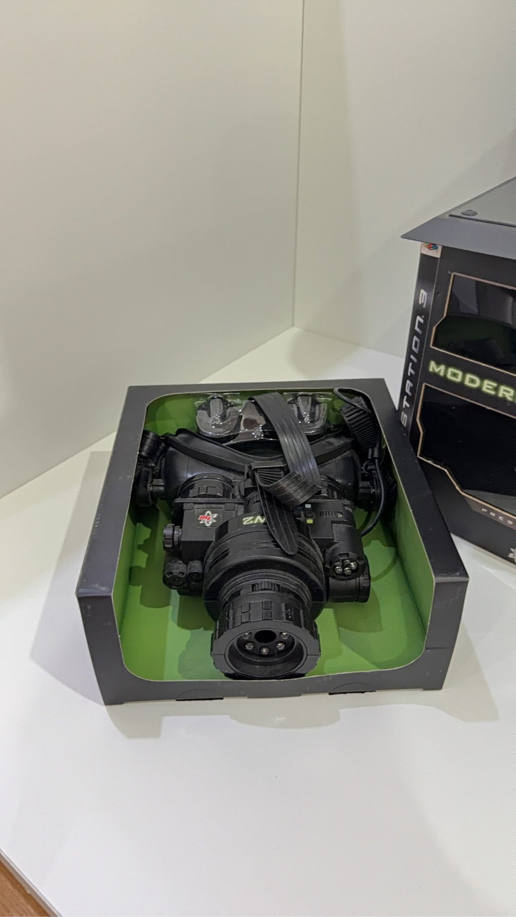 Call of Duty Modern Warfare 2 Prestige Edition PS3 with Night Vision Goggles and display stand.