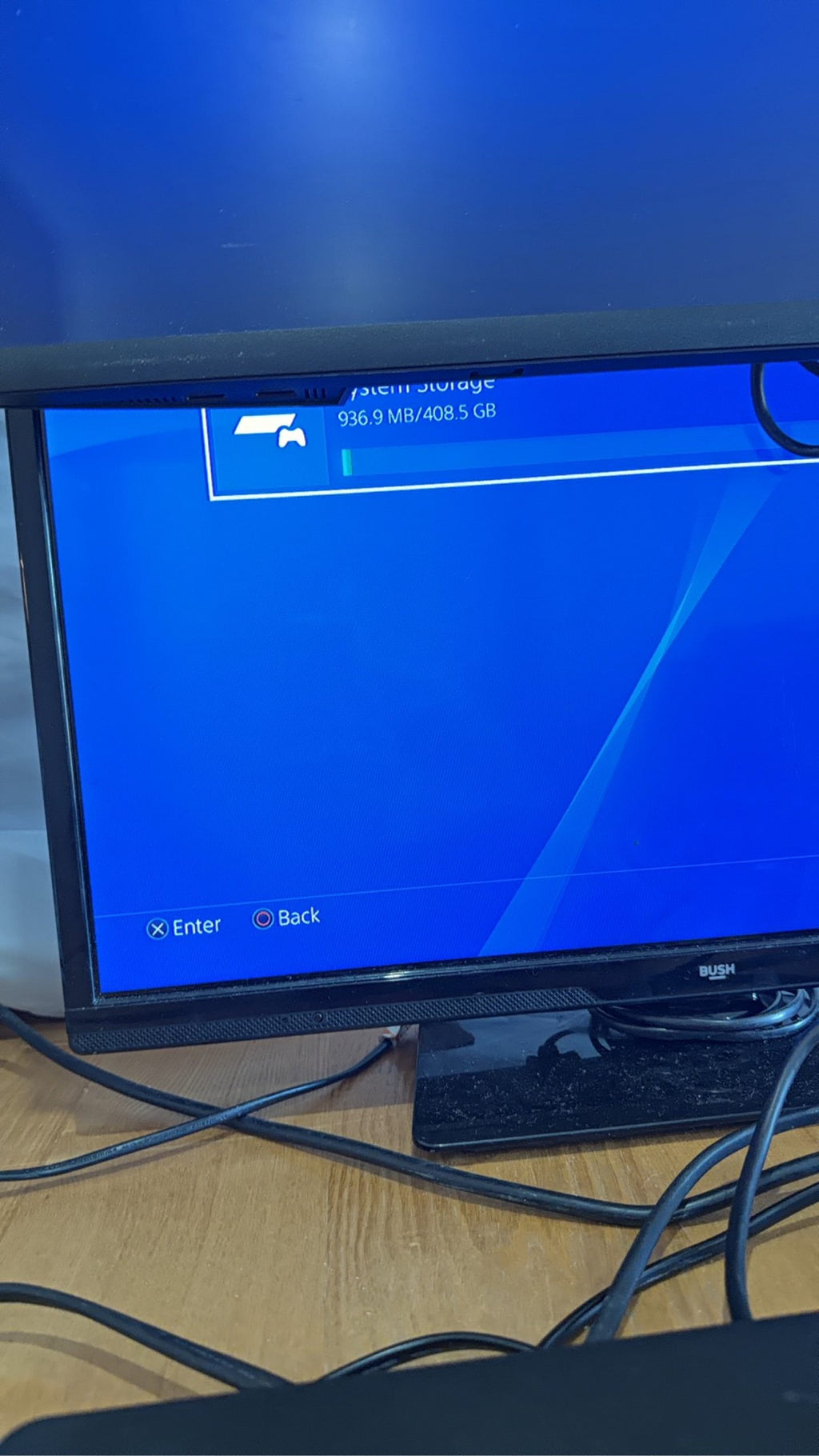 PlayStation 4 Slim PS4 Black 500GB console with official silver Dualshock 4 controller.