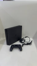 PS4 Slim PlayStation 4 Black 500GB console with official Dualshock 4 controller and cables.