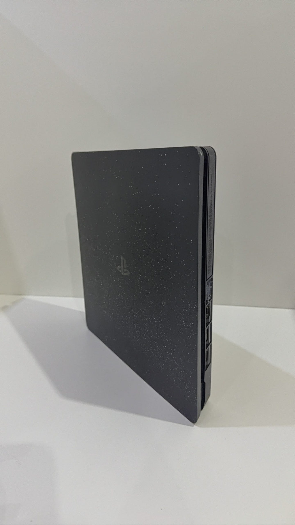 PS4 Slim PlayStation 4 Black 500GB console with official Dualshock 4 controller and cables.