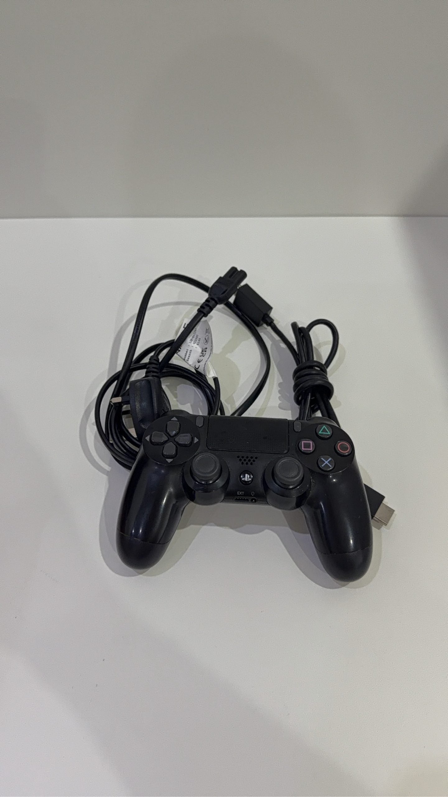PS4 Slim PlayStation 4 Black 500GB console with official Dualshock 4 controller and cables.
