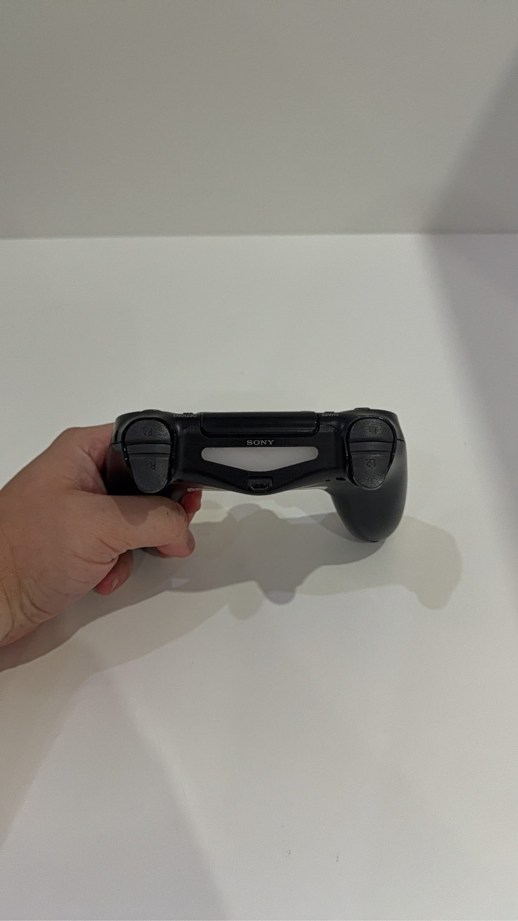 PS4 Slim PlayStation 4 Black 500GB console with official Dualshock 4 controller and cables.