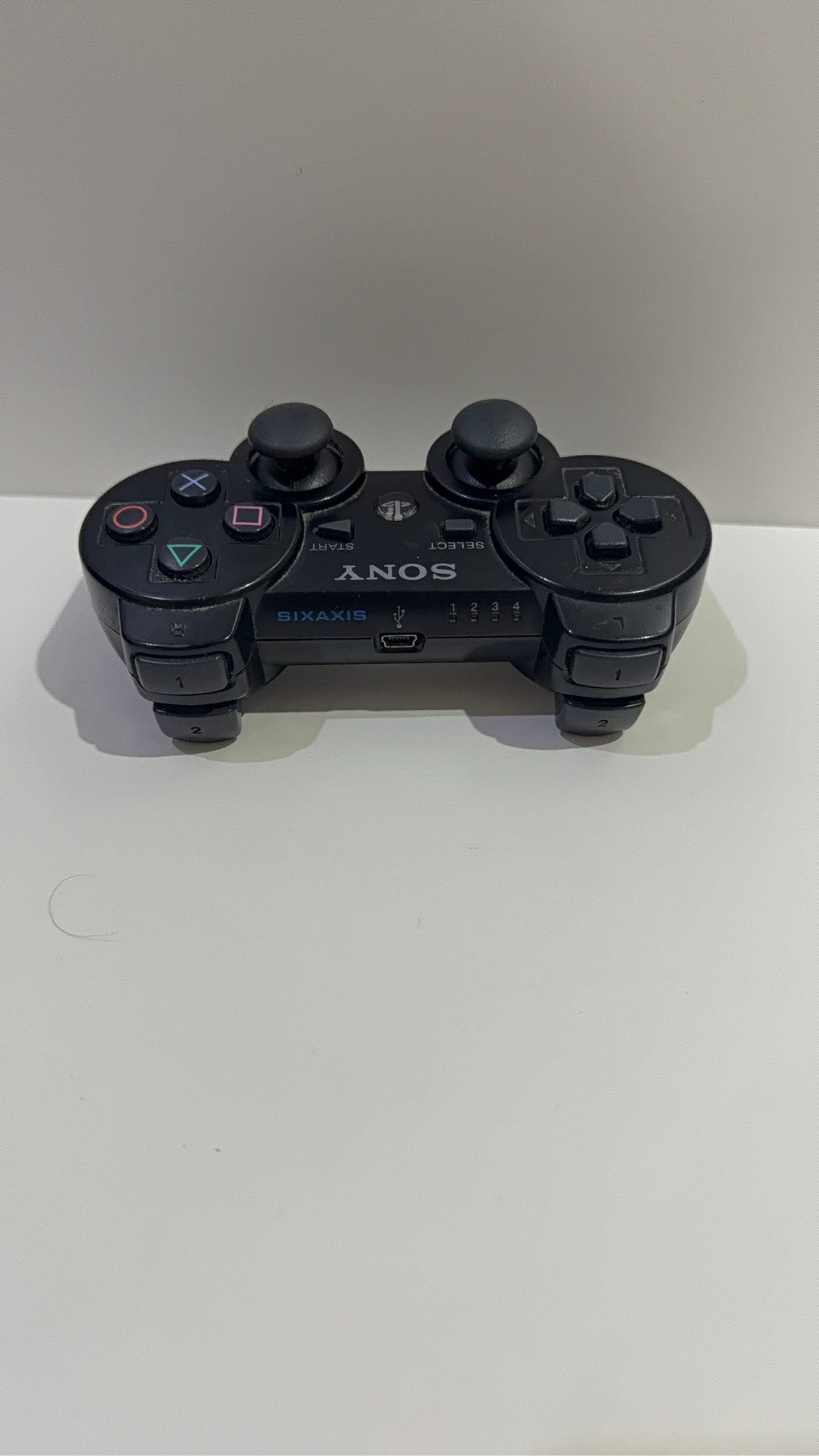 Sony PlayStation 3 PS3 Console 80GB Black with Dualshock 3 Controller and 5 games.