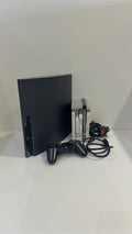 Sony PlayStation 3 320GB Black Console with Controller, cables, and 5 games included.