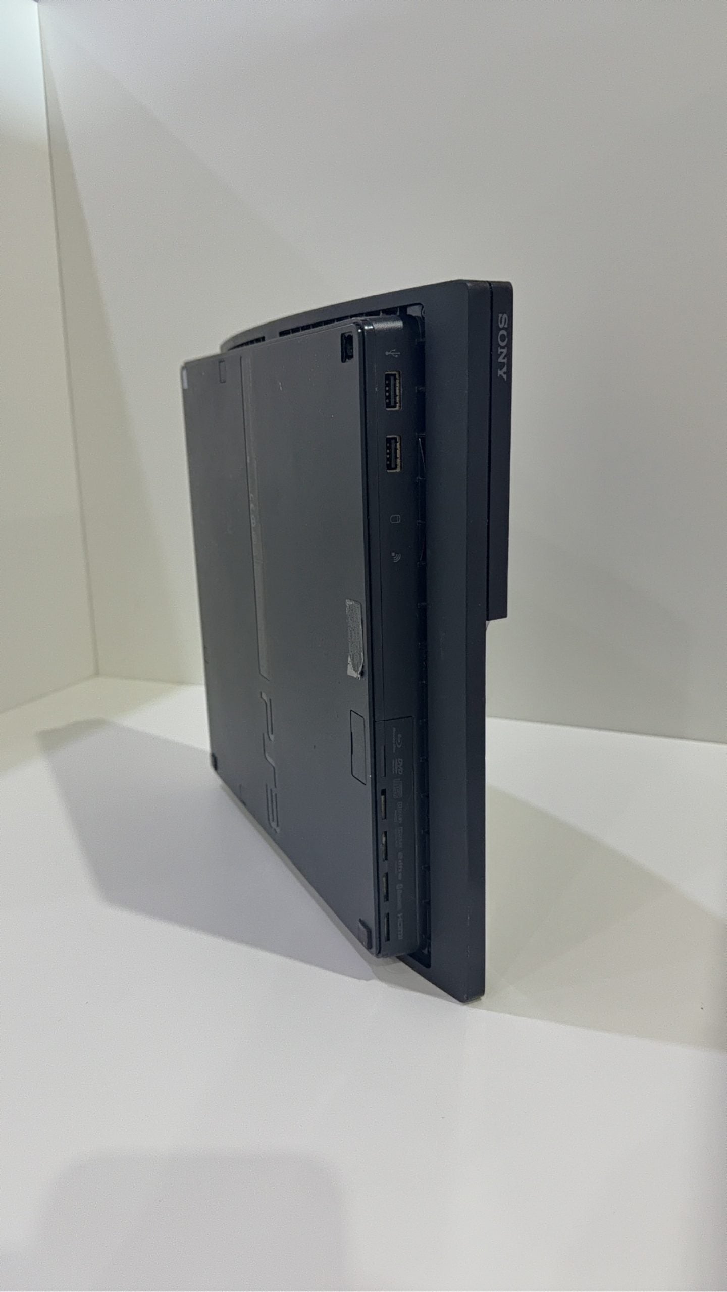 Sony PlayStation 3 320GB Black Console with Controller, cables, and 5 games included.