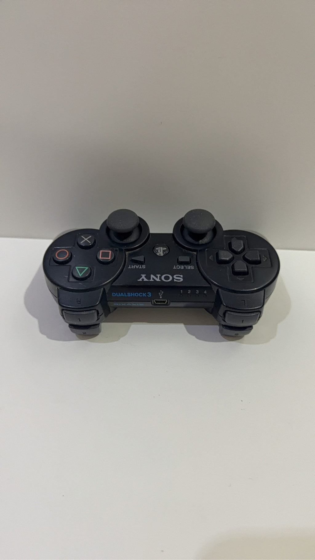 Sony PlayStation 3 320GB Black Console with Controller, cables, and 5 games included.