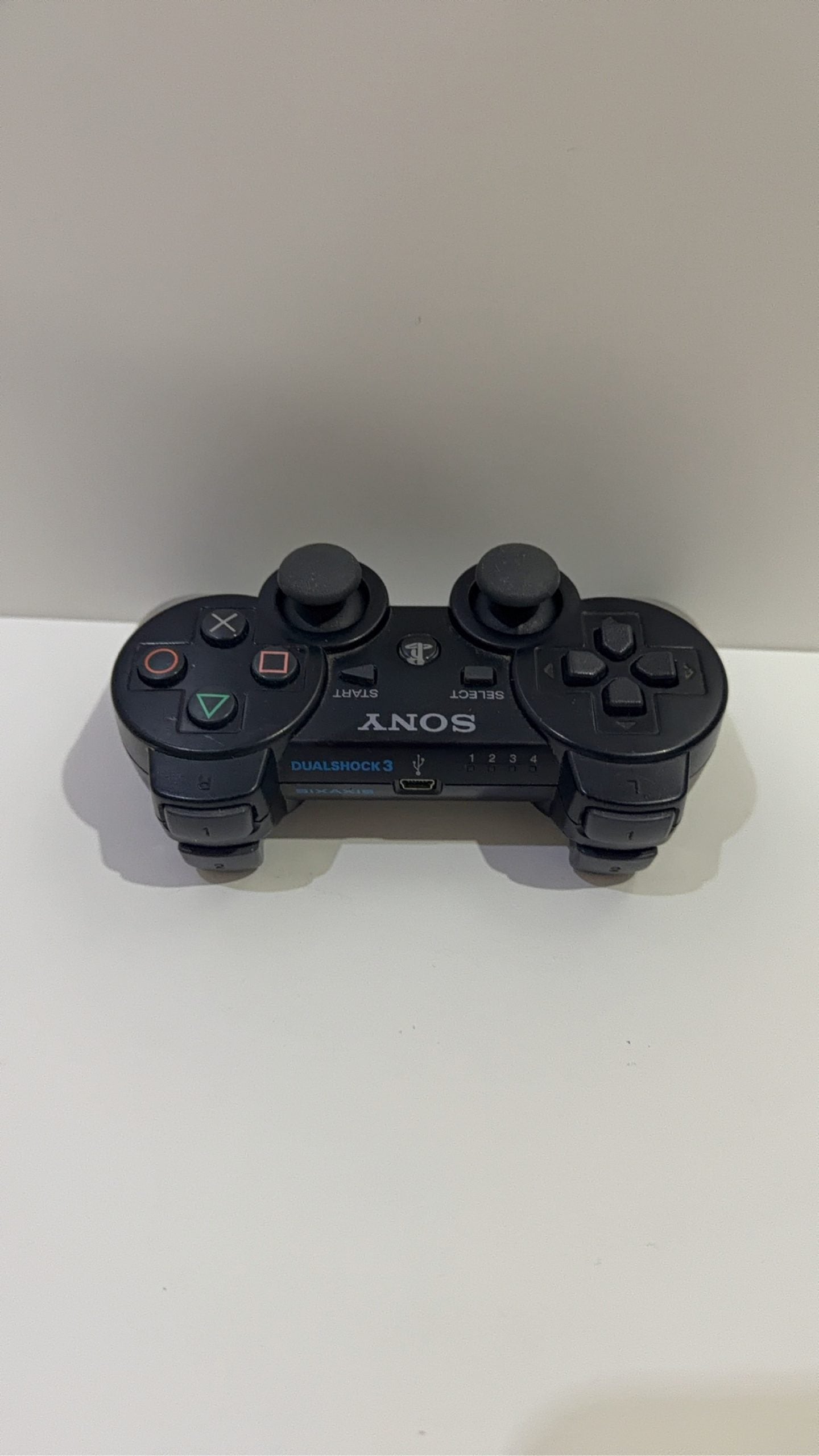 Sony PlayStation 3 320GB Black Console with Controller, cables, and 5 games included.