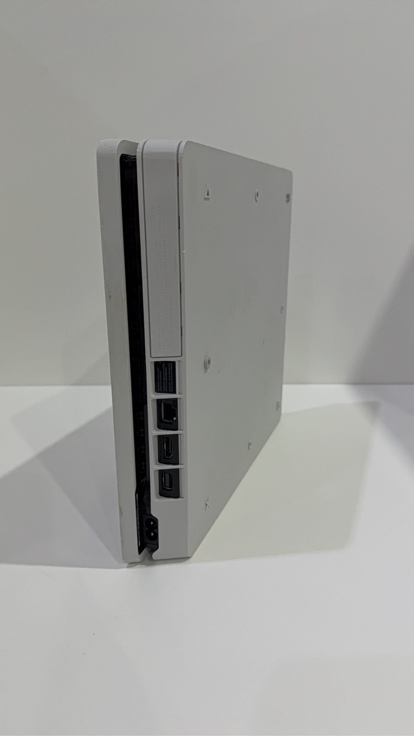 Sony PlayStation 4 Slim White 500GB Console with Controller and Cables, pre-owned gaming system.