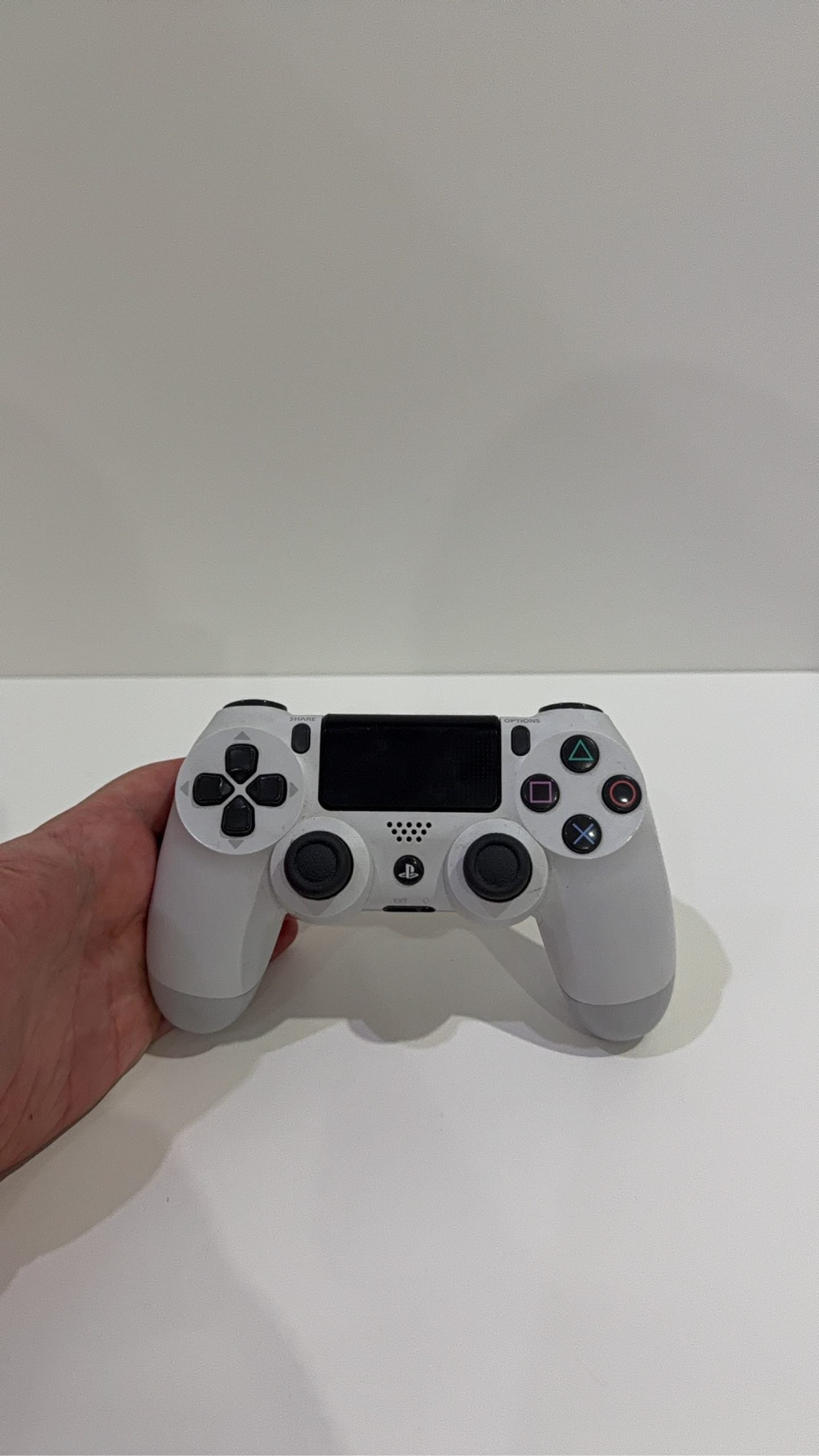 Sony PlayStation 4 Slim White 500GB Console with Controller and Cables, pre-owned gaming system.