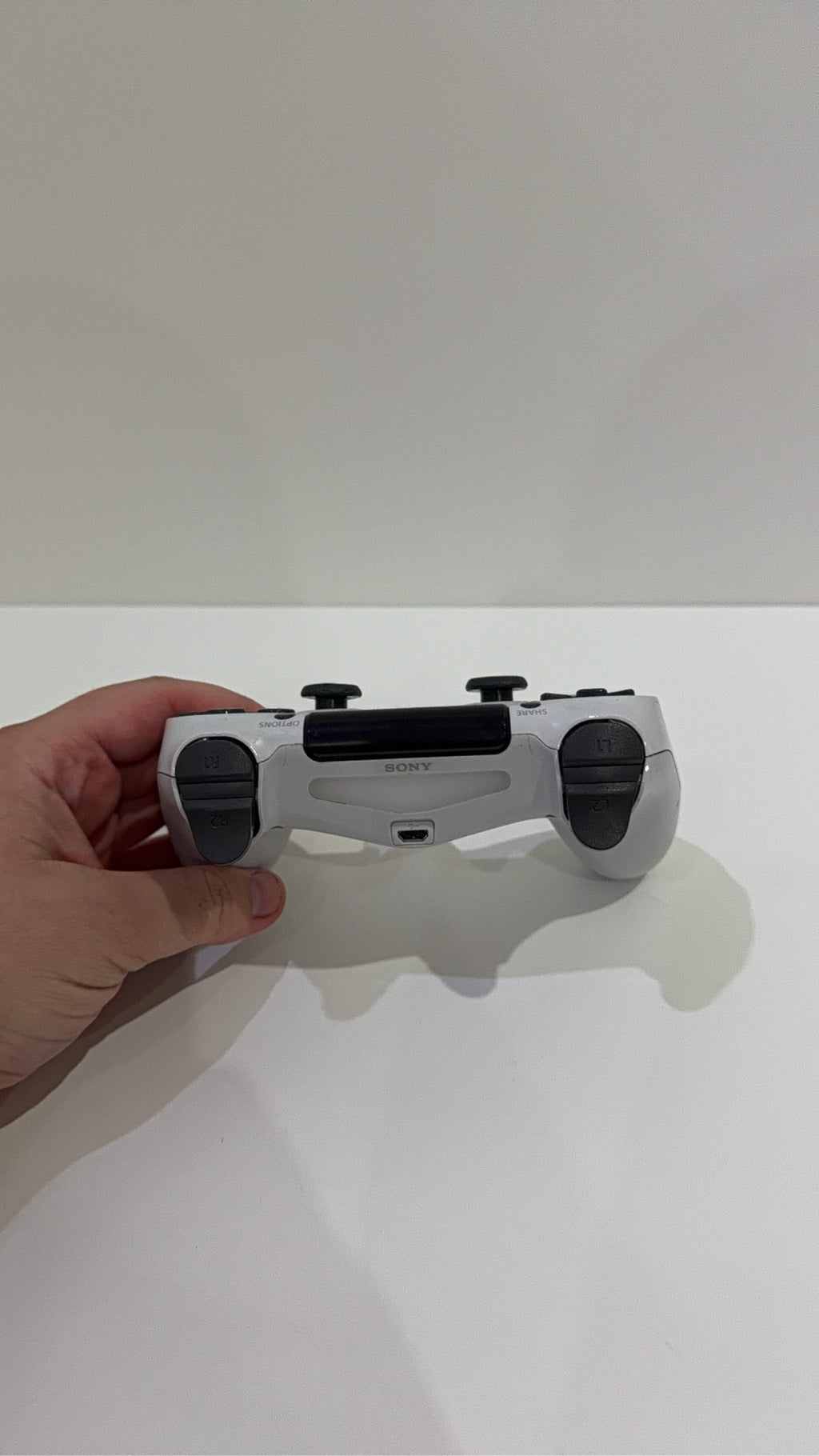 Sony PlayStation 4 Slim White 500GB Console with Controller and Cables, pre-owned gaming system.