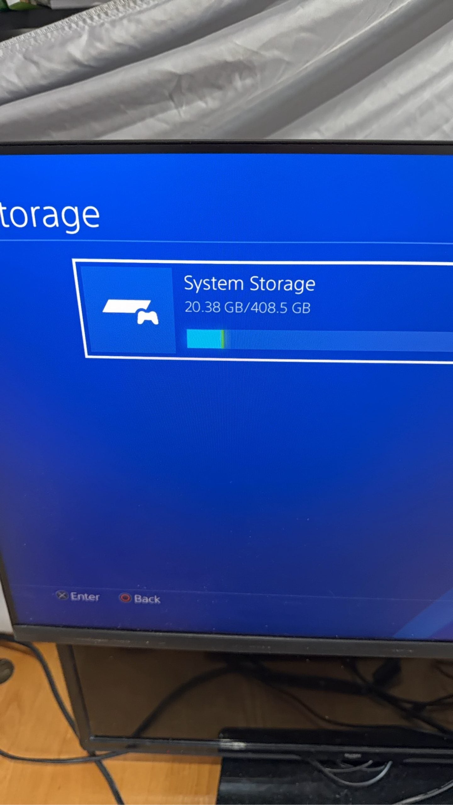 Sony PlayStation 4 Slim 500GB Black Console with Camo Controller and power cables.