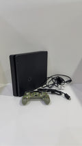 Sony PlayStation 4 Slim 500GB Black Console with Camo Controller and power cables.