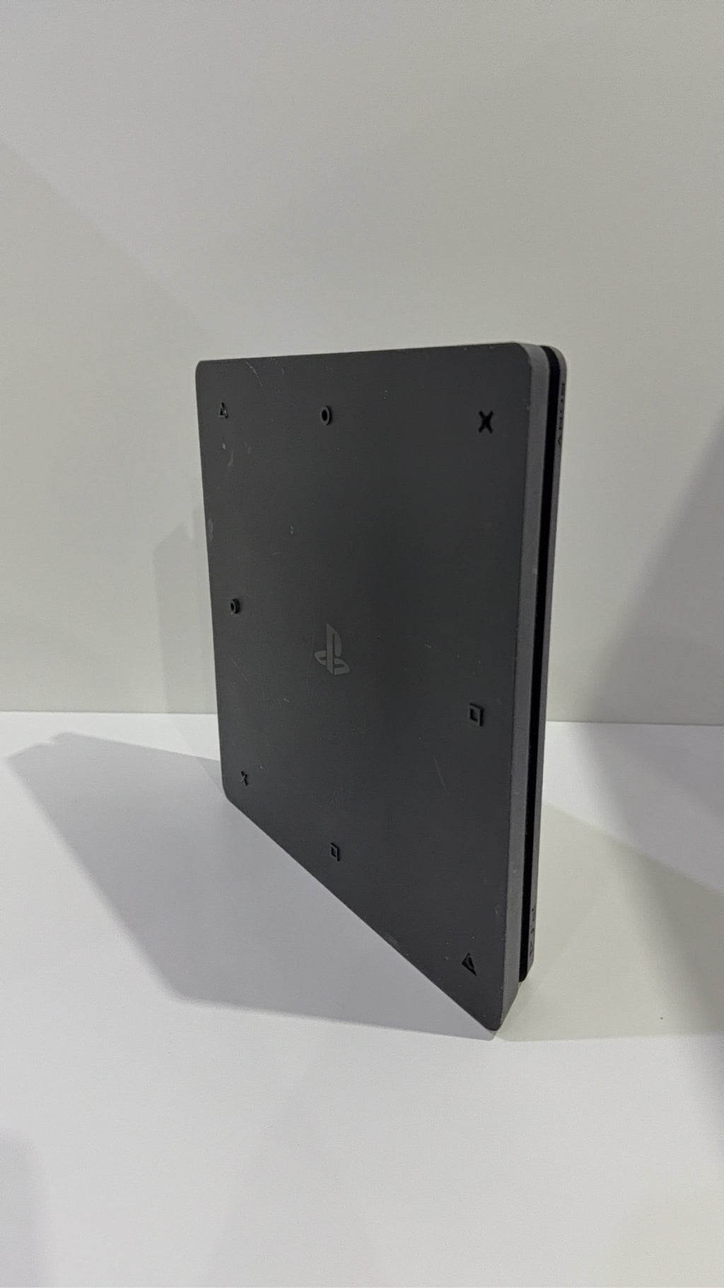 Sony PlayStation 4 Slim 500GB Black Console with Camo Controller and power cables.