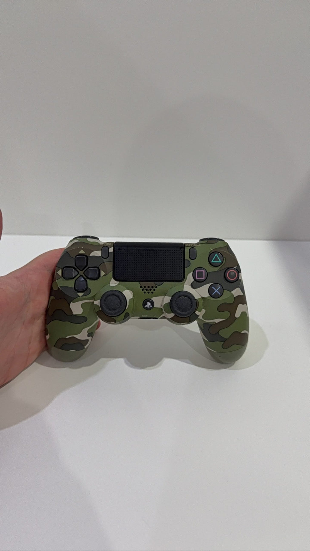 Sony PlayStation 4 Slim 500GB Black Console with Camo Controller and power cables.