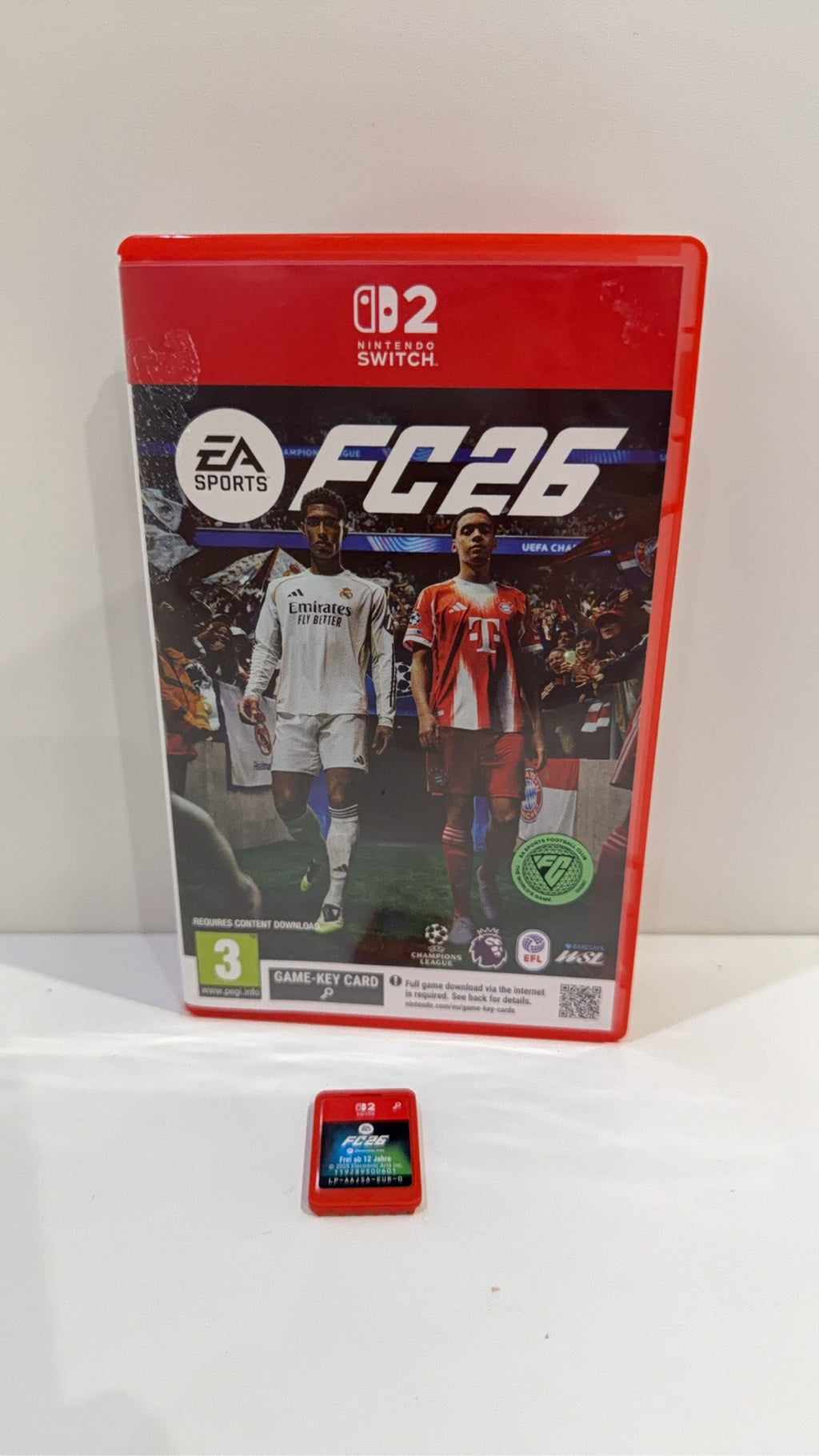 FC 26 Nintendo Switch 2 video game cartridge with original case and cover artwork.