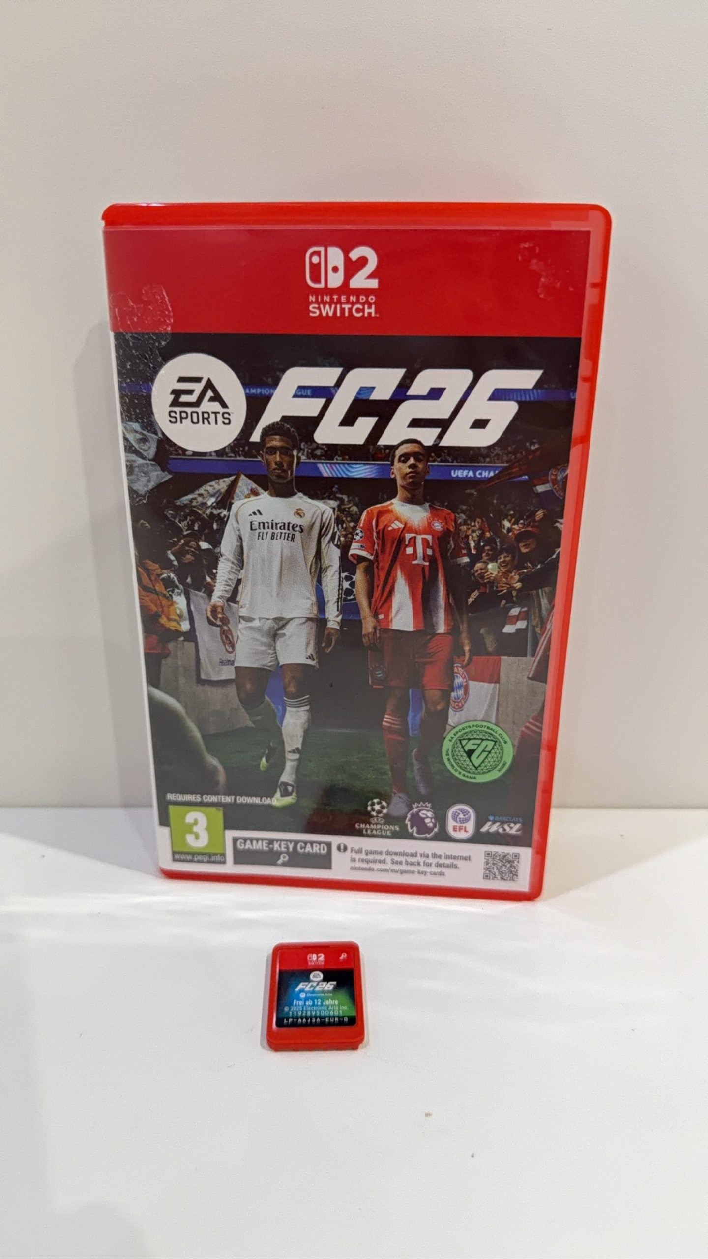 FC 26 Nintendo Switch 2 video game cartridge with original case and cover artwork.