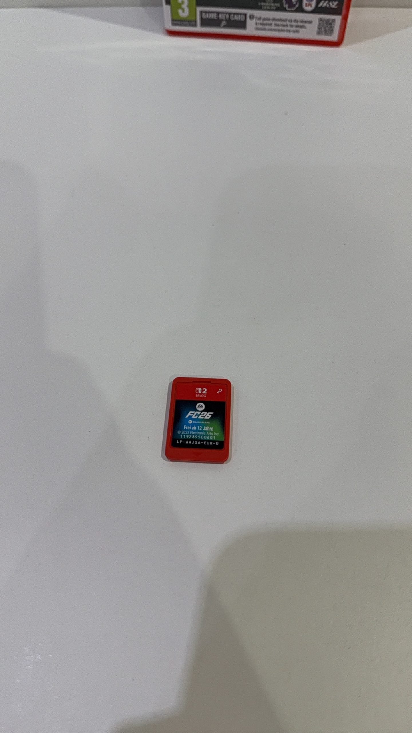 FC 26 Nintendo Switch 2 video game cartridge with original case and cover artwork.