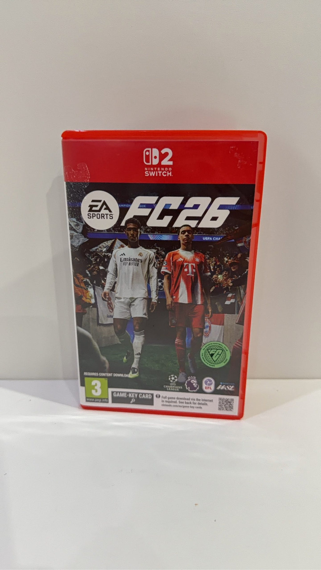 FC 26 Nintendo Switch 2 video game cartridge with original case and cover artwork.