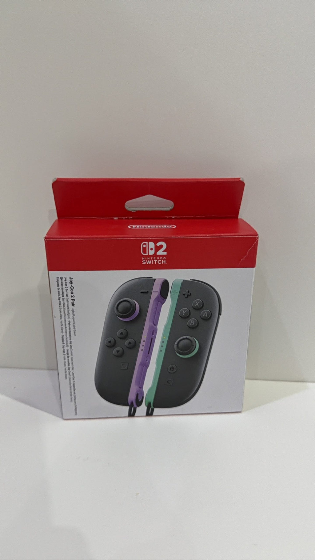Nintendo Switch 2 Joy-Con Controller Pair in Purple and Green, fully tested and working.