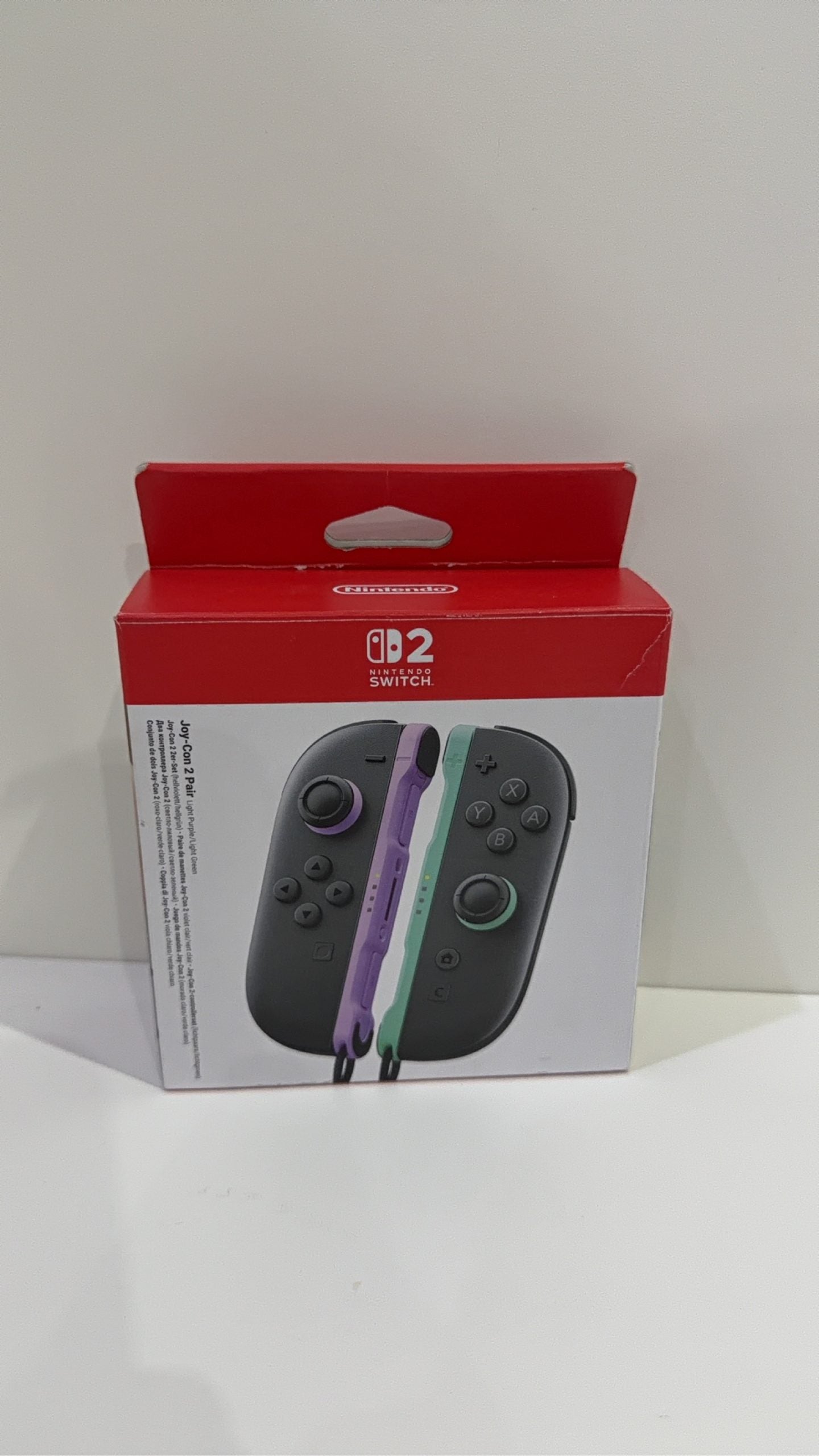 Nintendo Switch 2 Joy-Con Controller Pair in Purple and Green, fully tested and working.