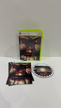 Saw The Video Game for Xbox 360, complete with manual, original case, and cover artwork.
