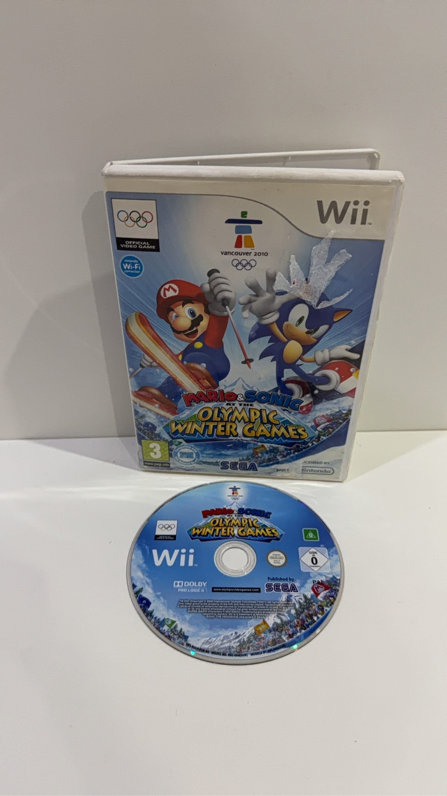 Nintendo Wii Console White Wii Fit Plus Bundle with accessories and games, tested in very good condition.